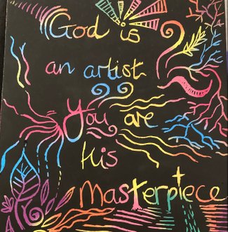 'God is an artist you are His masterpiece' written on scratch art at Christian dance weekend